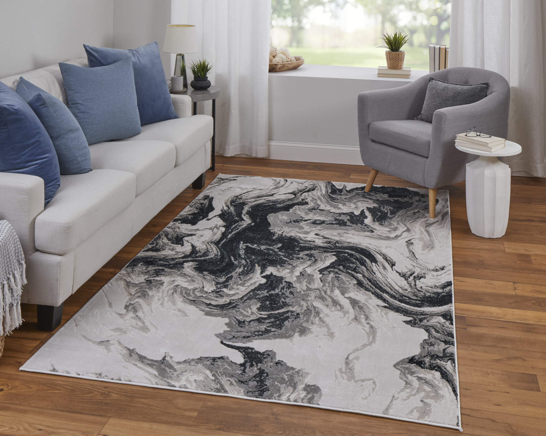 10" X 13" Ivory Black and Taupe Abstract Power Loom Area Rug