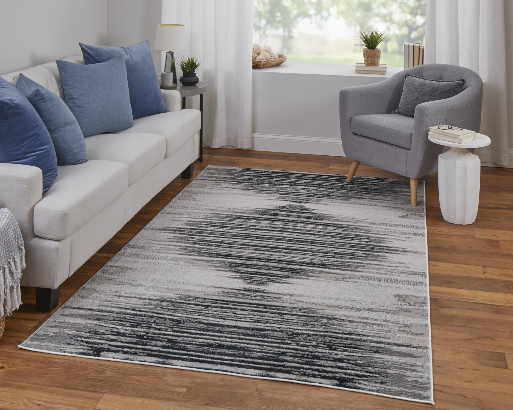 5" X 8" Black and Silver Geometric Power Loom Area Rug