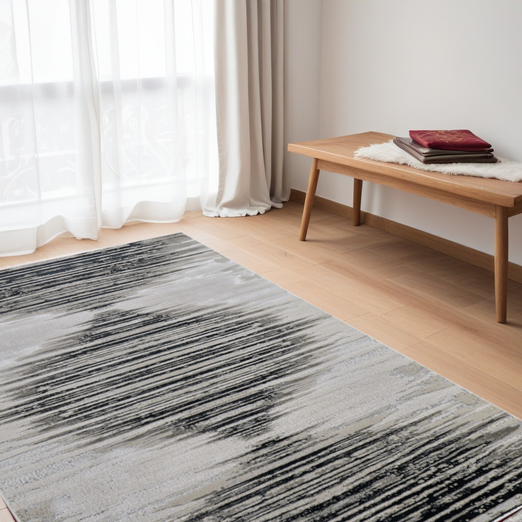 5" X 8" Black and Silver Geometric Power Loom Area Rug