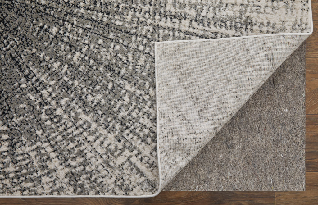 7" X 10" Gray and Ivory Abstract Power Loom Area Rug