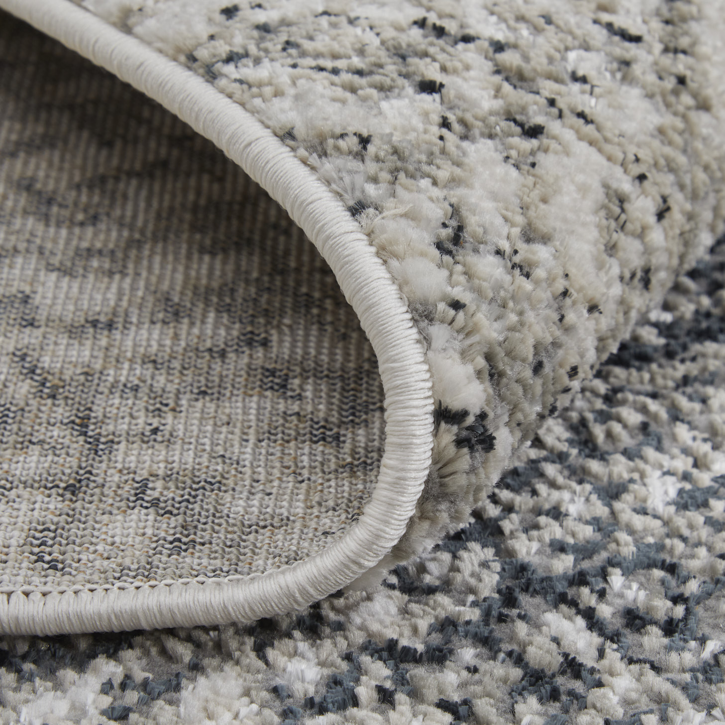 7" X 10" Gray and Ivory Abstract Power Loom Area Rug