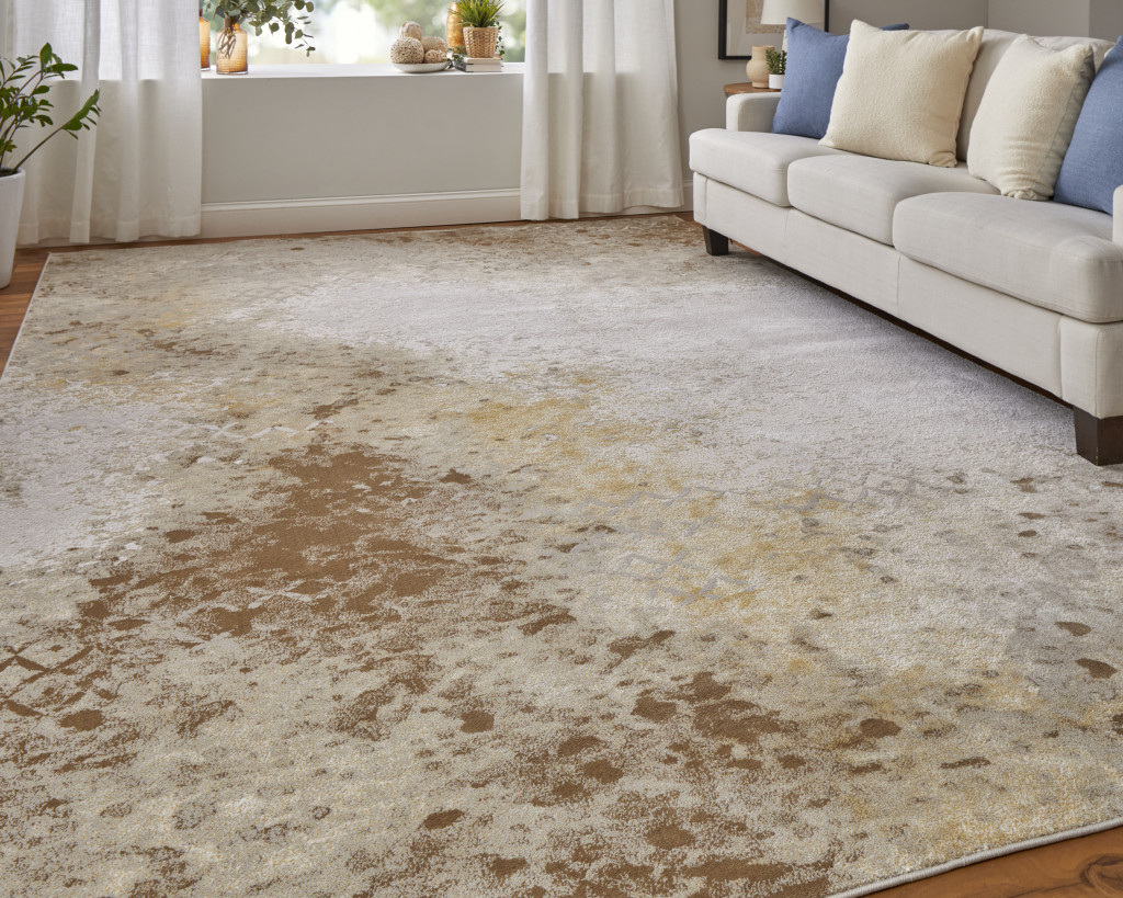 8" X 11" Tan and Ivory Abstract Power Loom Worn Faded Area Rug