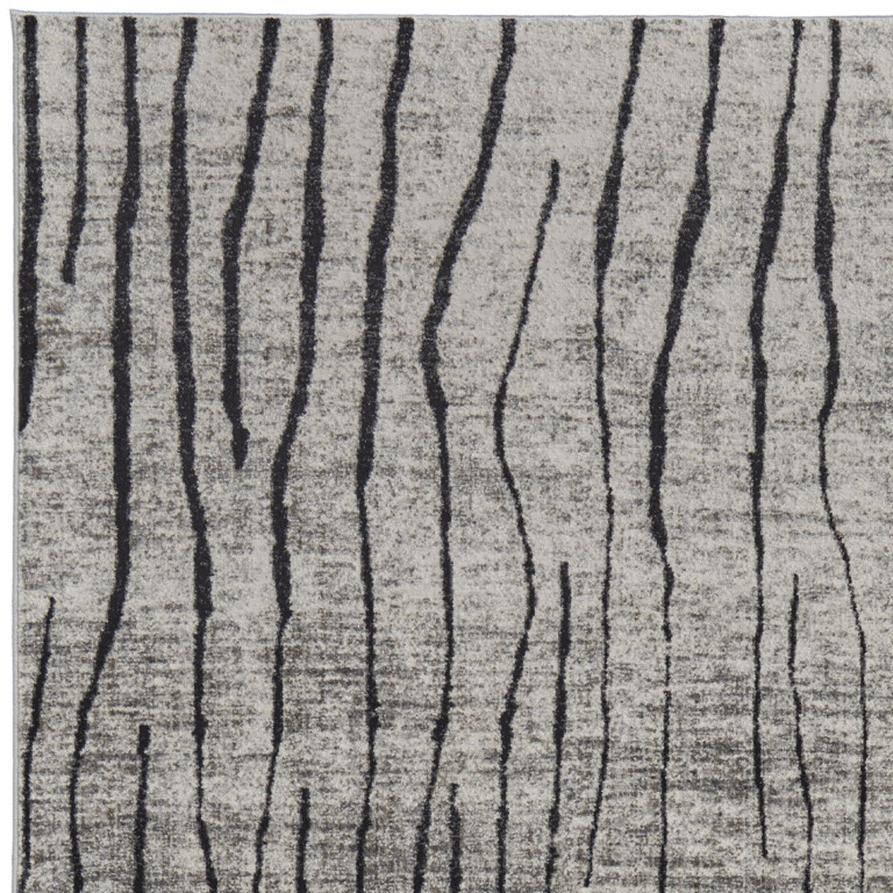 7" X 10" Gray and Black Abstract Power Loom Area Rug