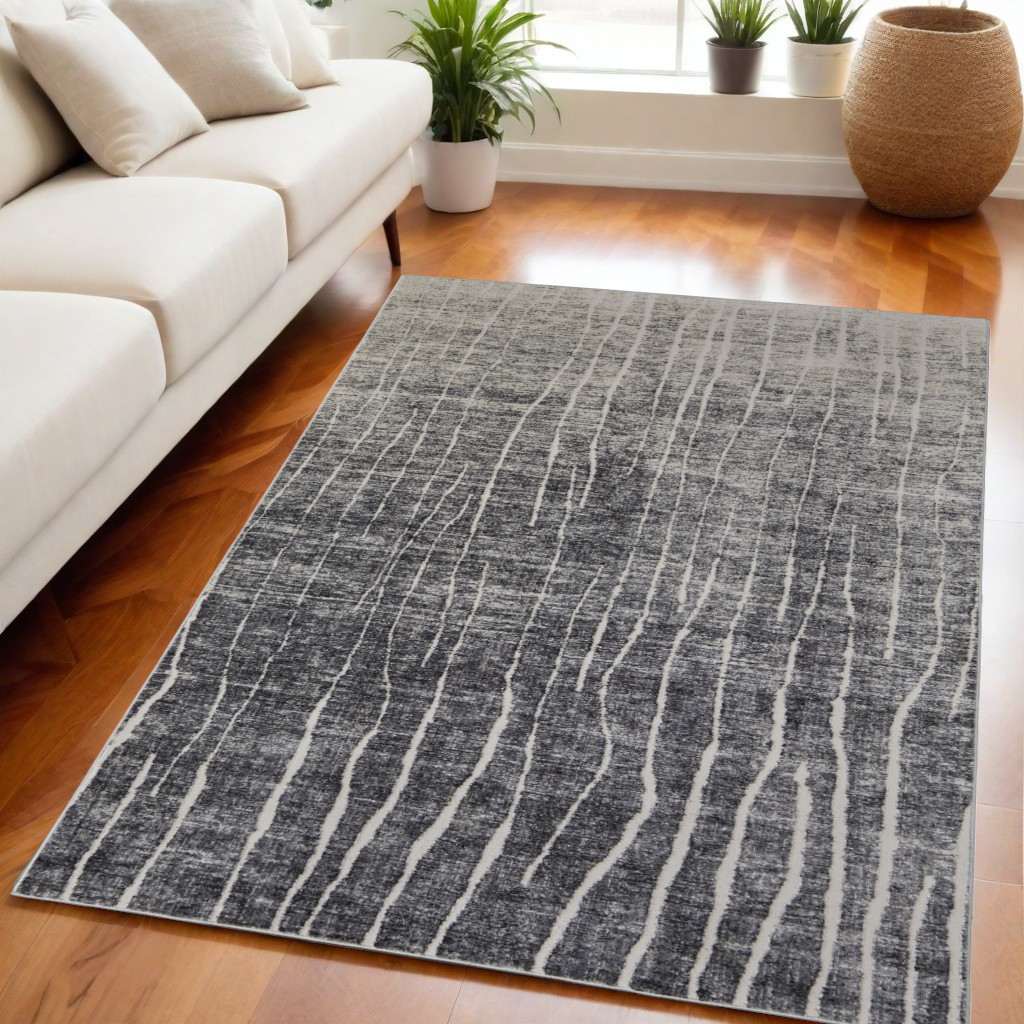 5" X 8" Ivory Gray and Black Abstract Power Loom Area Rug