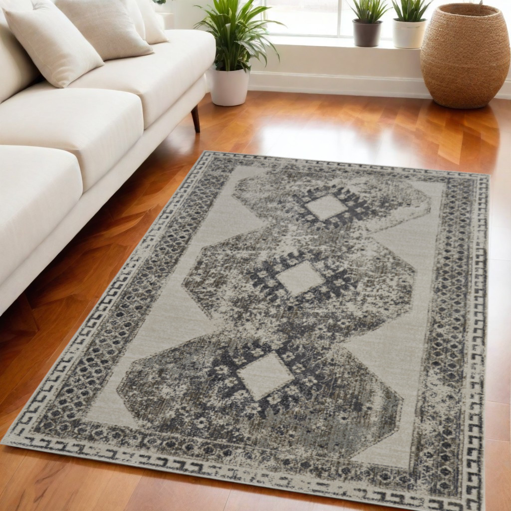 5" X 8" Gray and Ivory Abstract Power Loom Worn Faded Area Rug