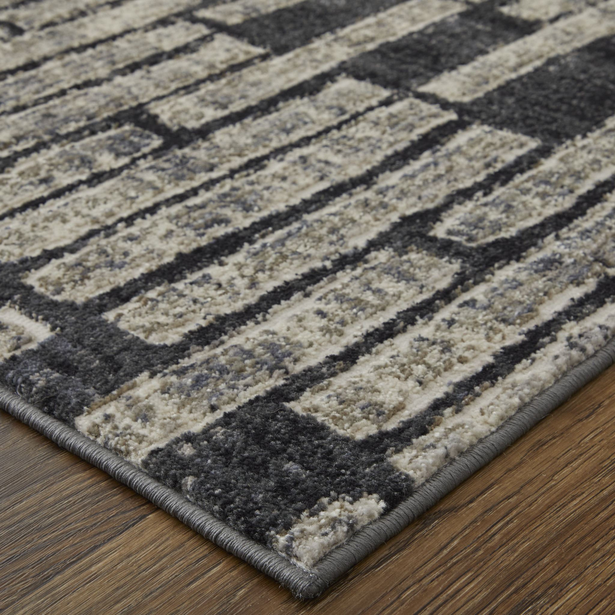 5" X 8" Gray and Black Geometric Power Loom Worn Faded Area Rug