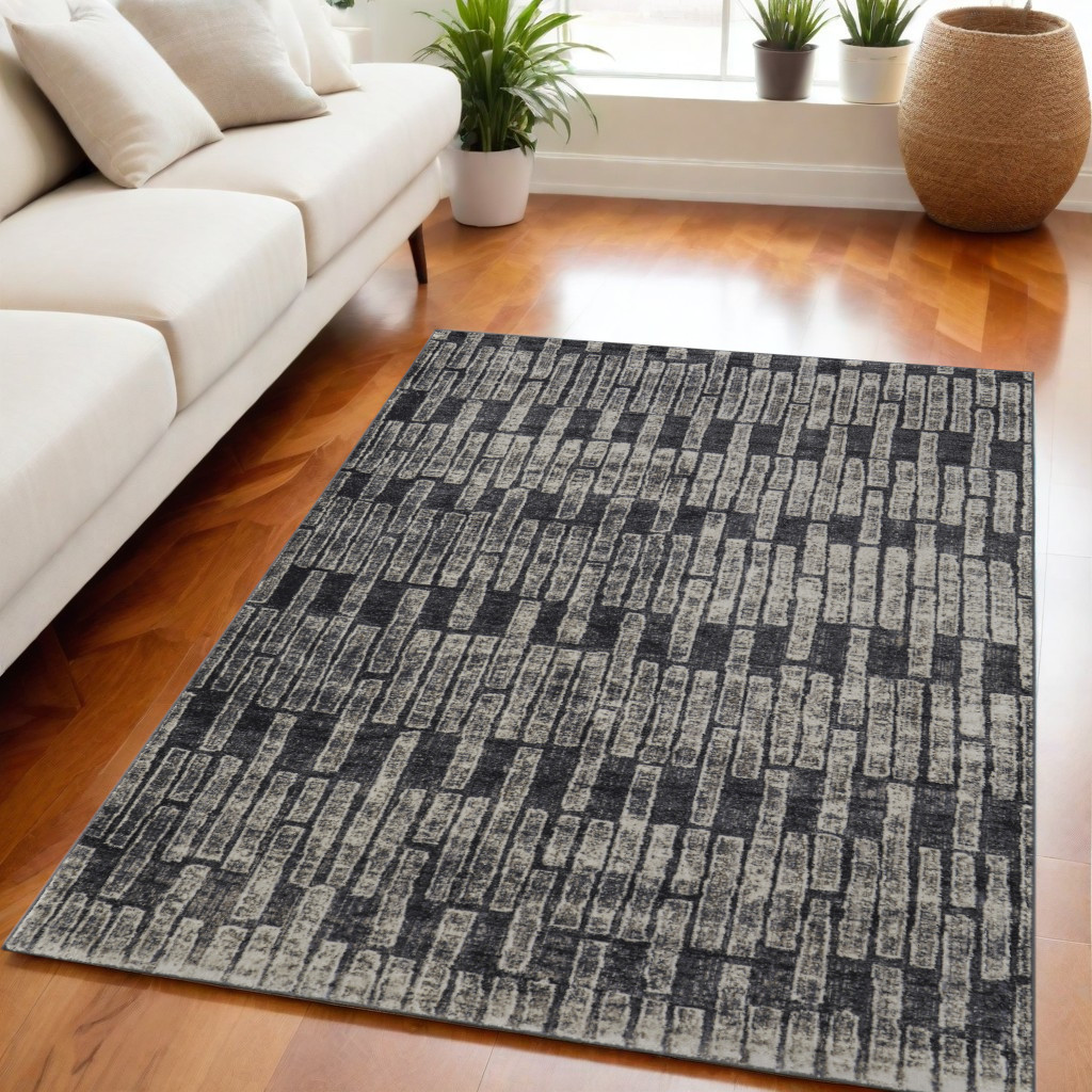 5" X 8" Gray and Black Geometric Power Loom Worn Faded Area Rug
