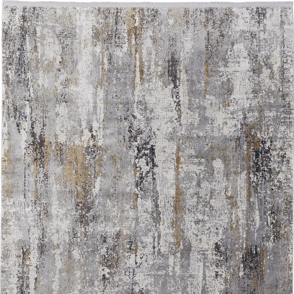 2" X 3" Gray Ivory and Gold Abstract Power Loom Area Rug With Fringe