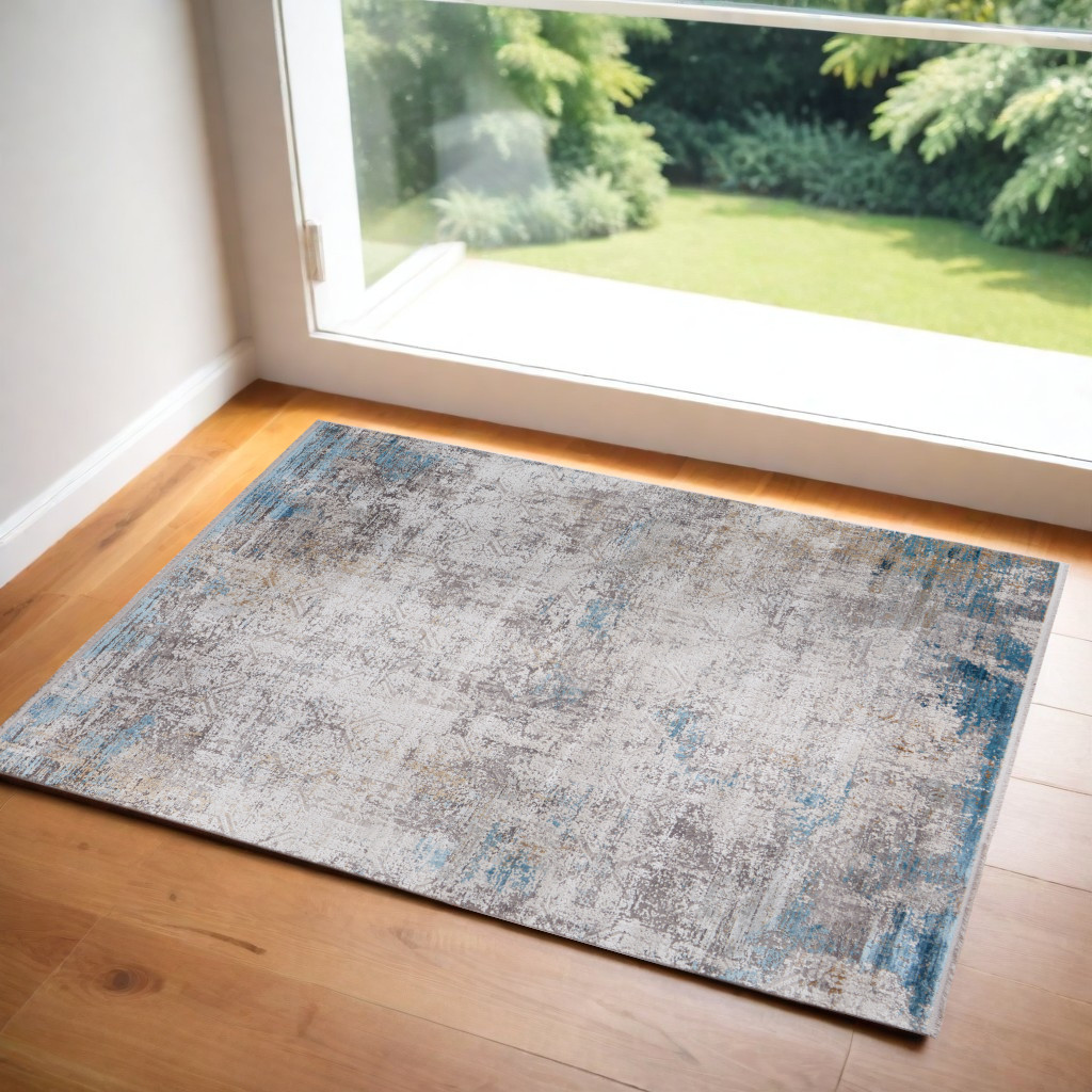 3" X 5" Ivory Gray and Blue Abstract Power Loom Area Rug With Fringe