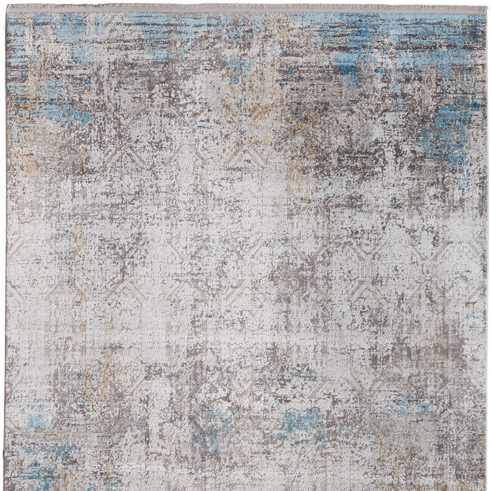 2" X 3" Ivory Gray and Blue Abstract Power Loom Area Rug With Fringe