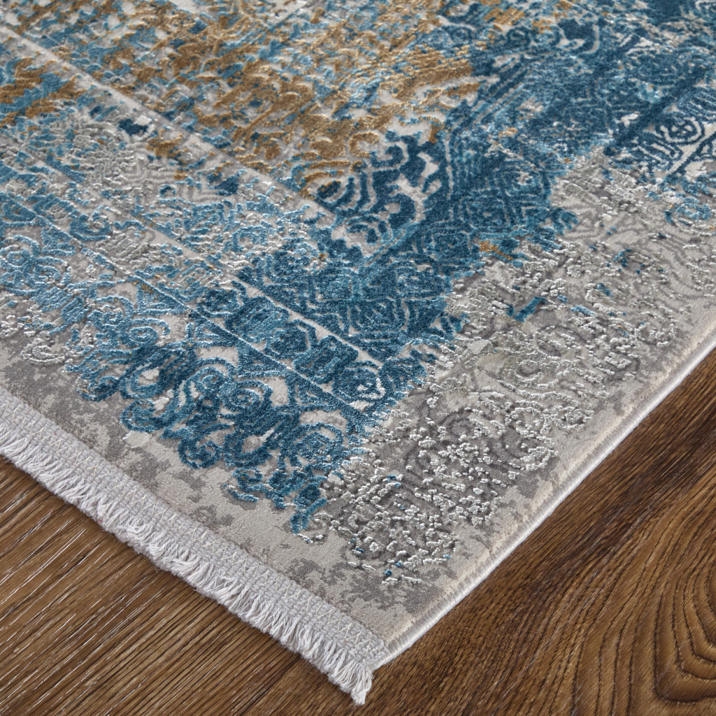 5" X 8" Blue Gold and Gray Abstract Power Loom Area Rug With Fringe