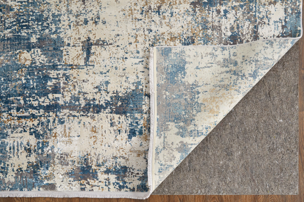 3" X 5" Ivory Tan and Blue Abstract Power Loom Area Rug With Fringe