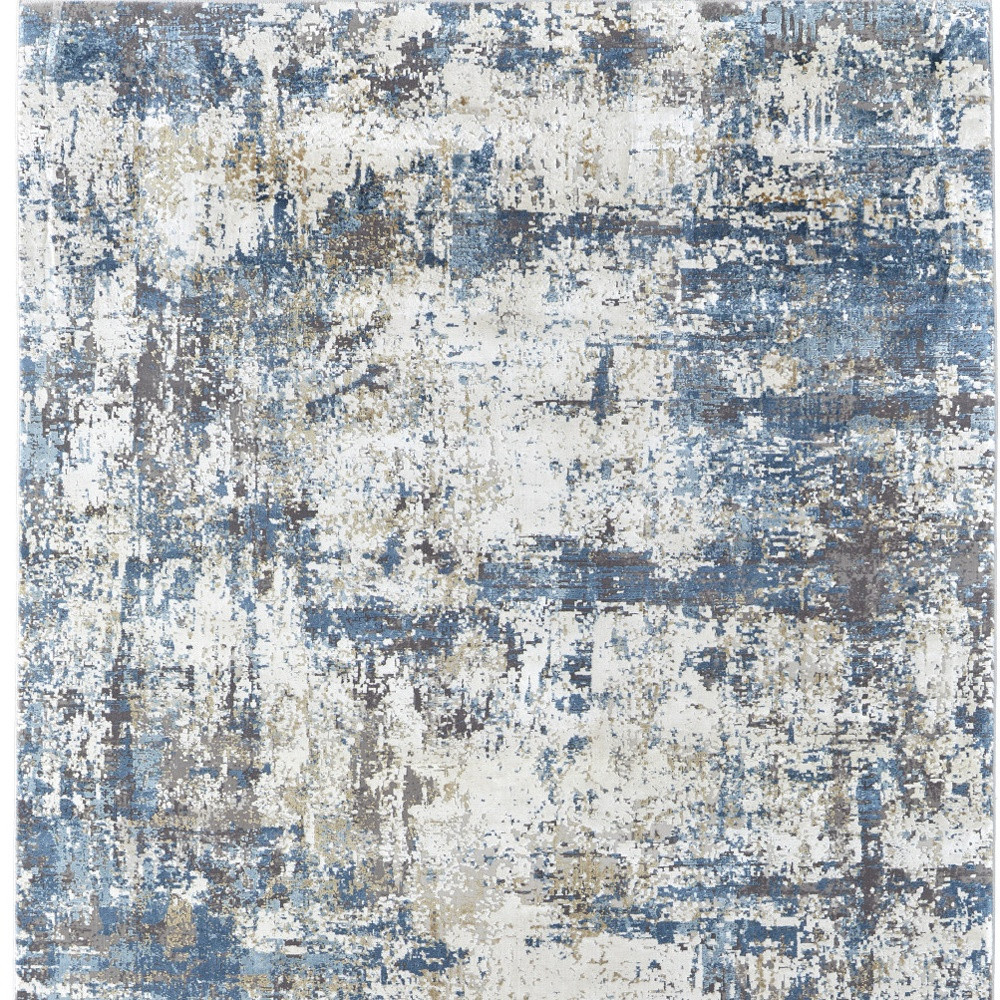 3" X 5" Ivory Tan and Blue Abstract Power Loom Area Rug With Fringe