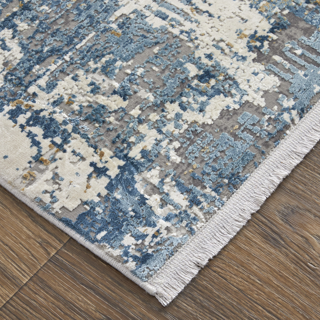 10" X 13" Ivory Tan and Blue Abstract Power Loom Area Rug With Fringe