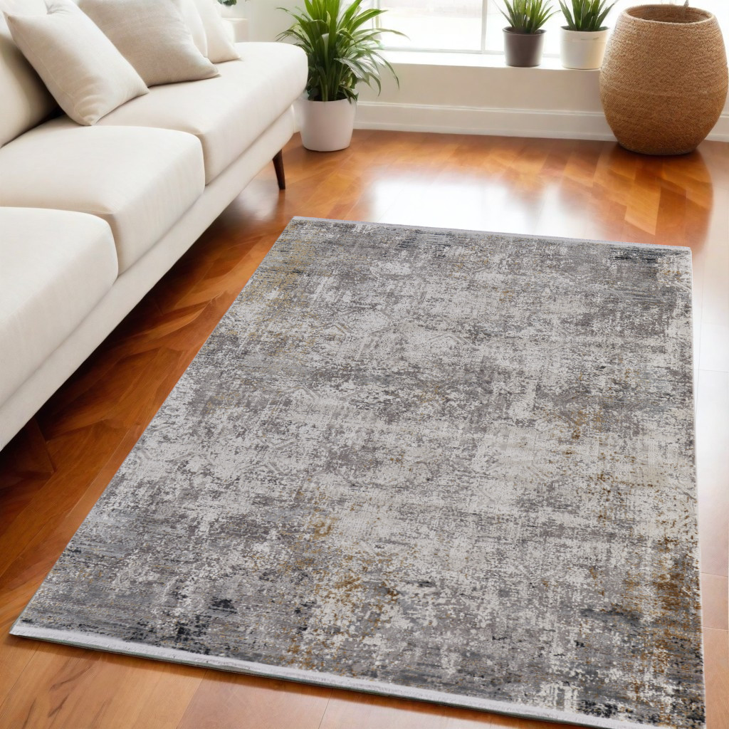 5" X 8" Ivory Taupe and Gray Abstract Power Loom Distressed Area Rug With Fringe