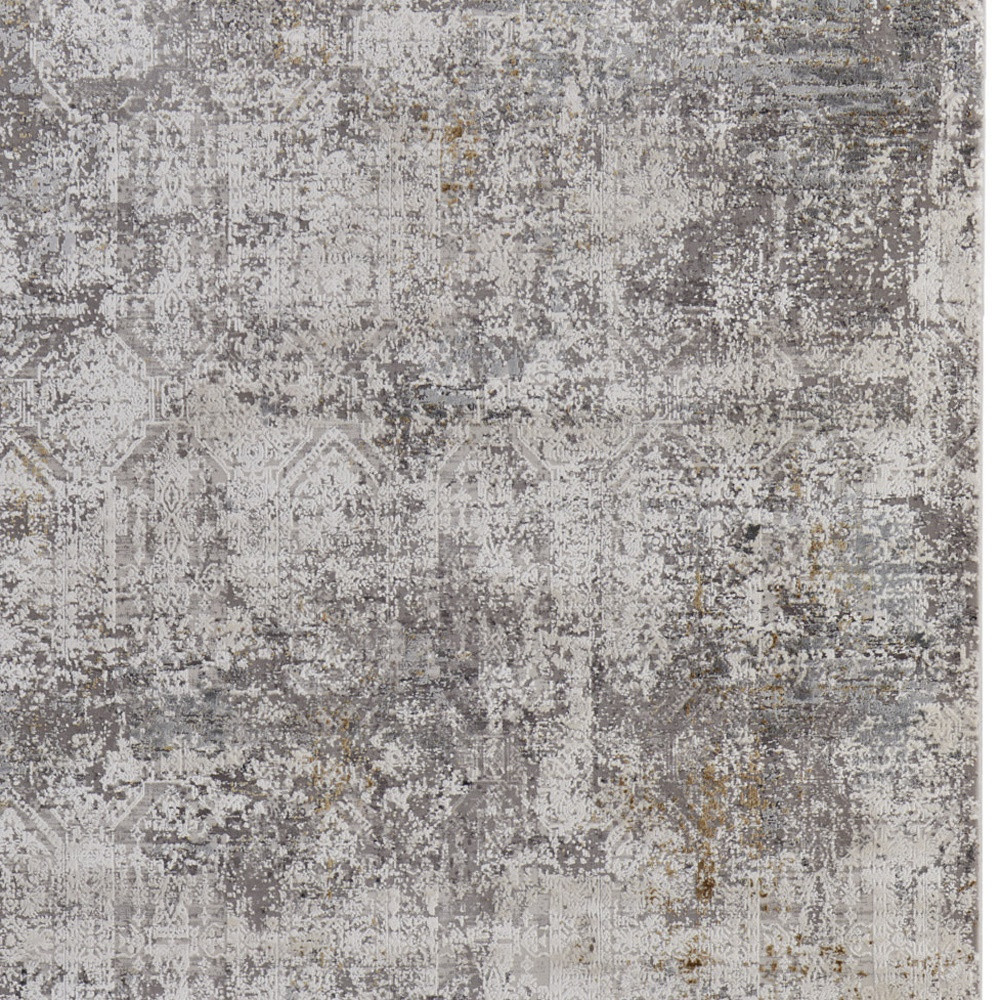 2" X 3" Ivory Taupe and Gray Abstract Power Loom Distressed Area Rug With Fringe