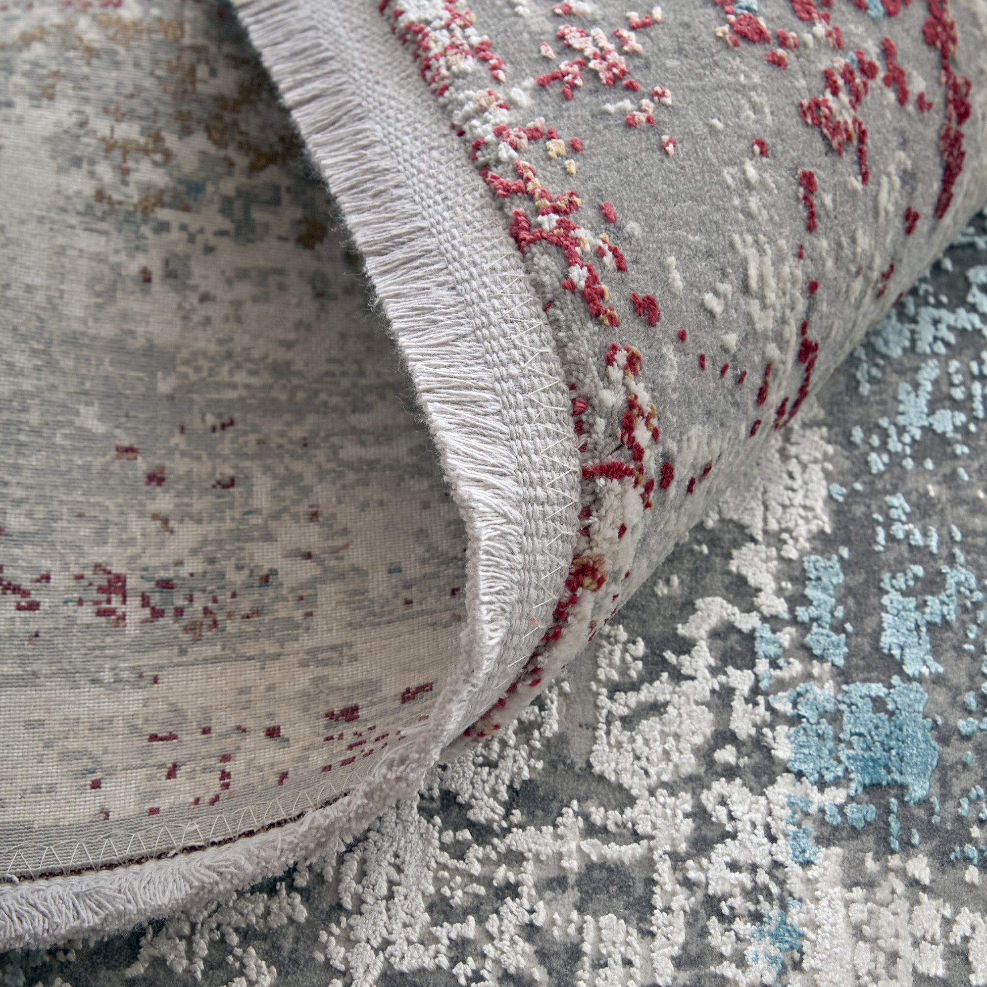 2" X 3" Gray Blue and Red Abstract Power Loom Area Rug With Fringe