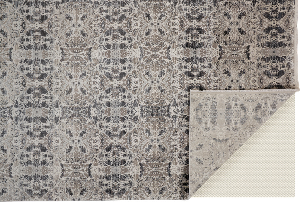 3" X 5" Ivory Taupe and Gray Oriental Power Loom Area Rug With Fringe