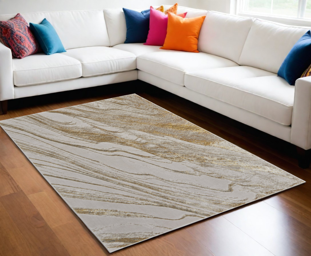 5" X 8" Ivory Brown and Gold Abstract Power Loom Area Rug