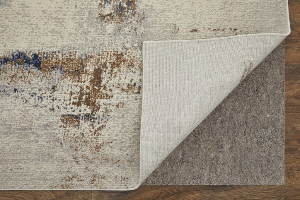 9" X 12" Ivory Blue and Brown Abstract Power Loom Area Rug