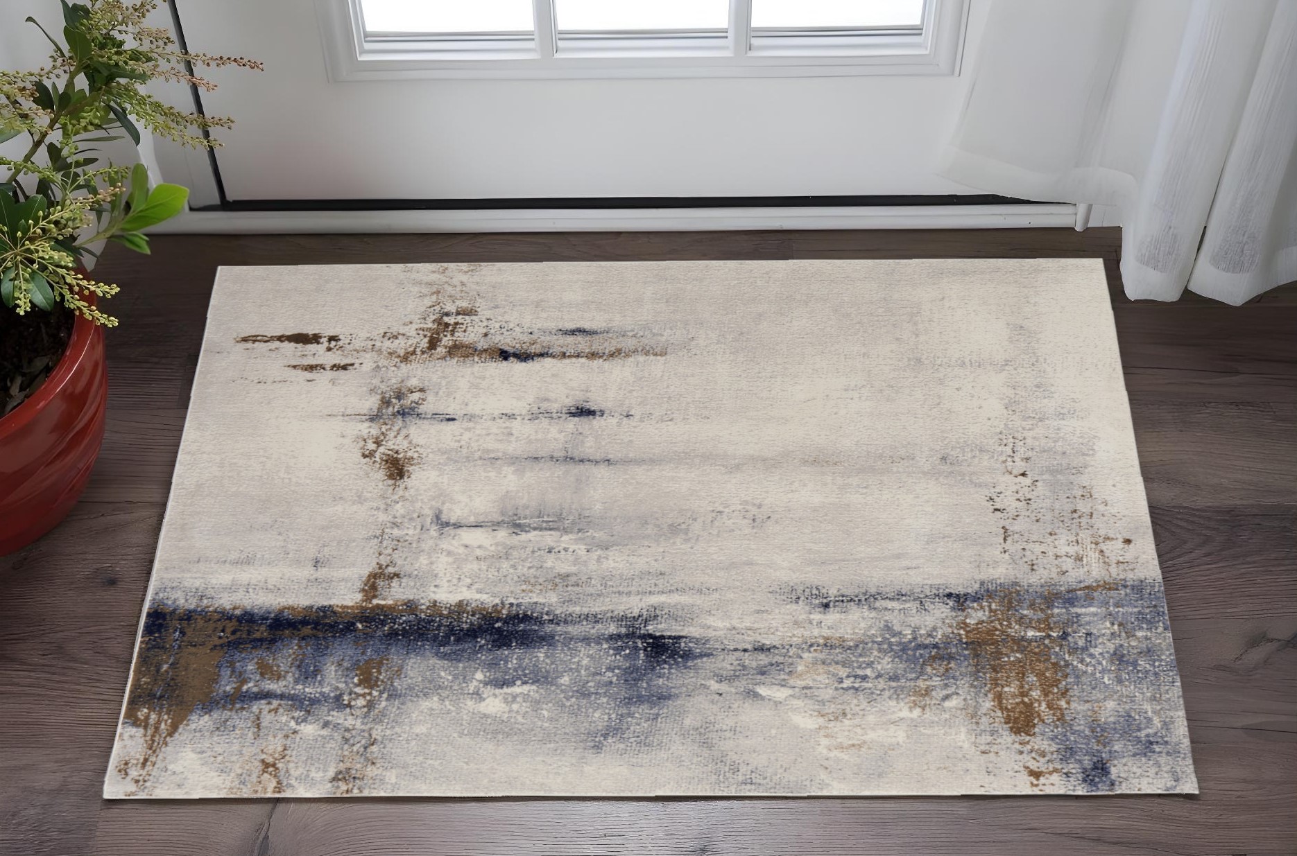 2" X 3" Ivory Blue and Brown Abstract Power Loom Area Rug