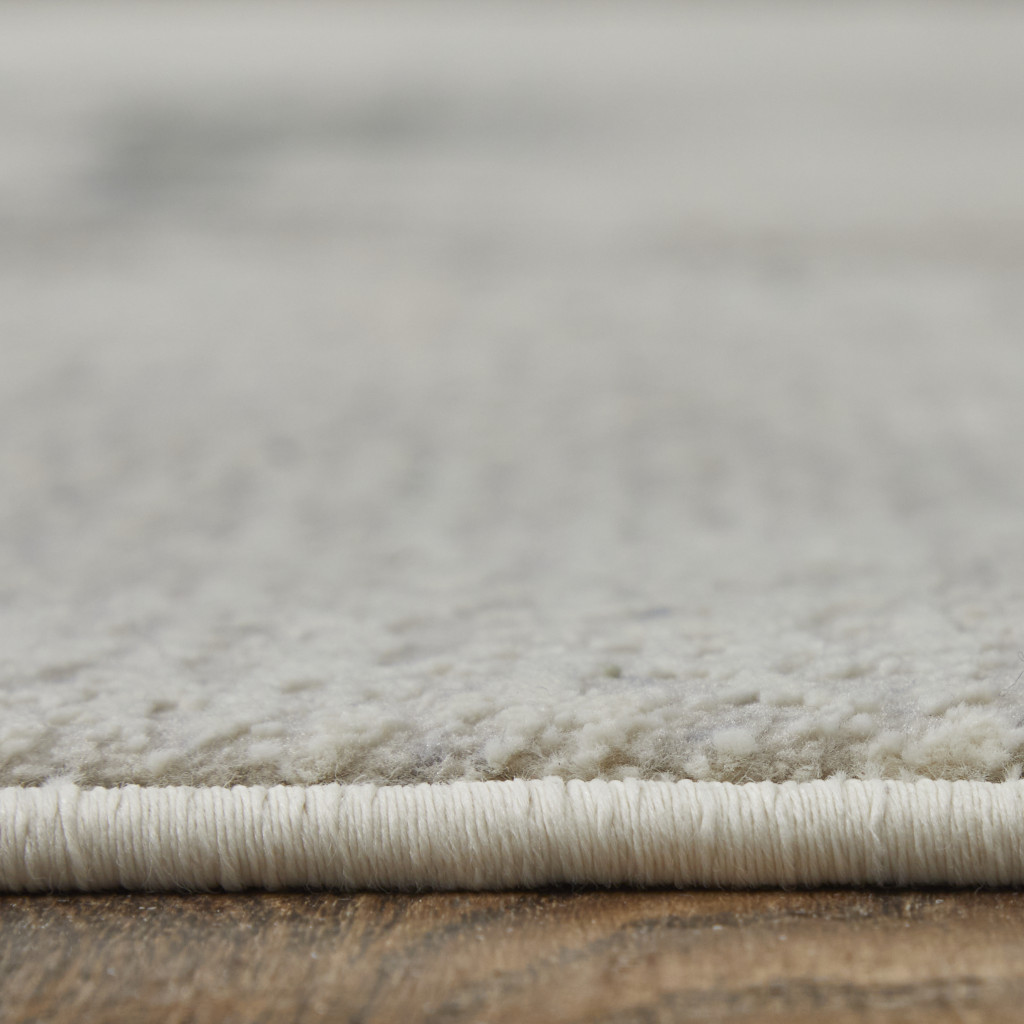 2" X 3" Ivory Blue and Brown Abstract Power Loom Area Rug