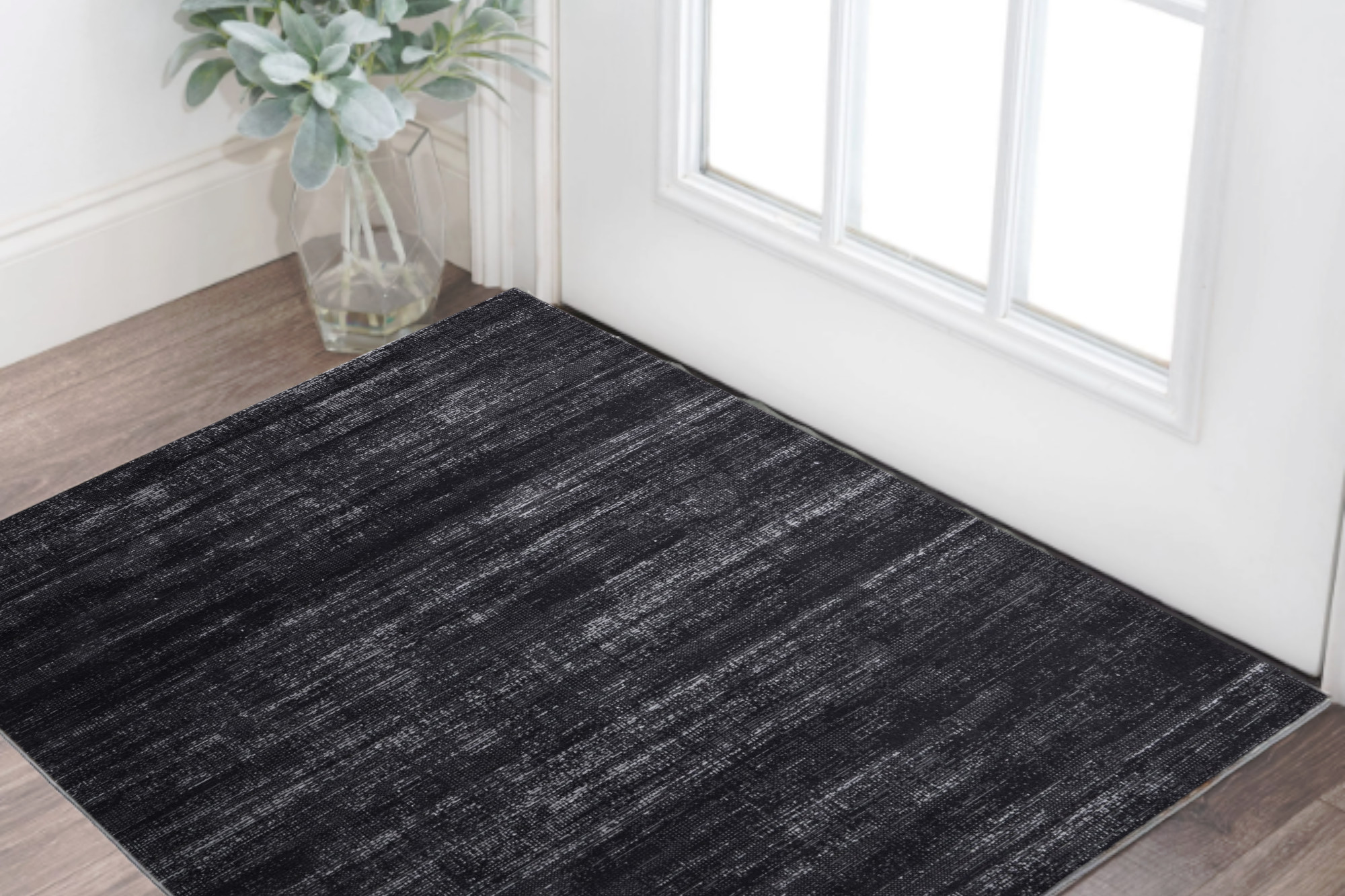2" X 3" Black and Gray Power Loom Area Rug