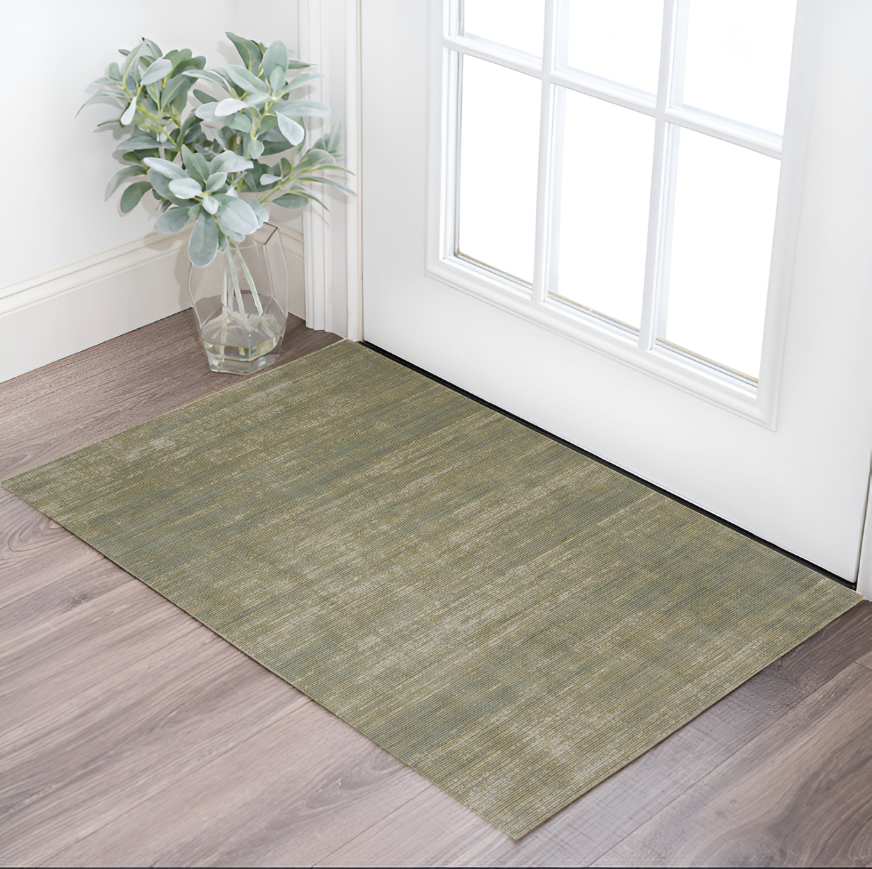 2" X 3" Tan and Green Power Loom Area Rug