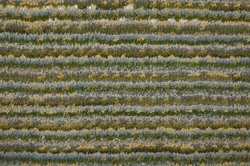 2" X 3" Tan and Green Power Loom Area Rug