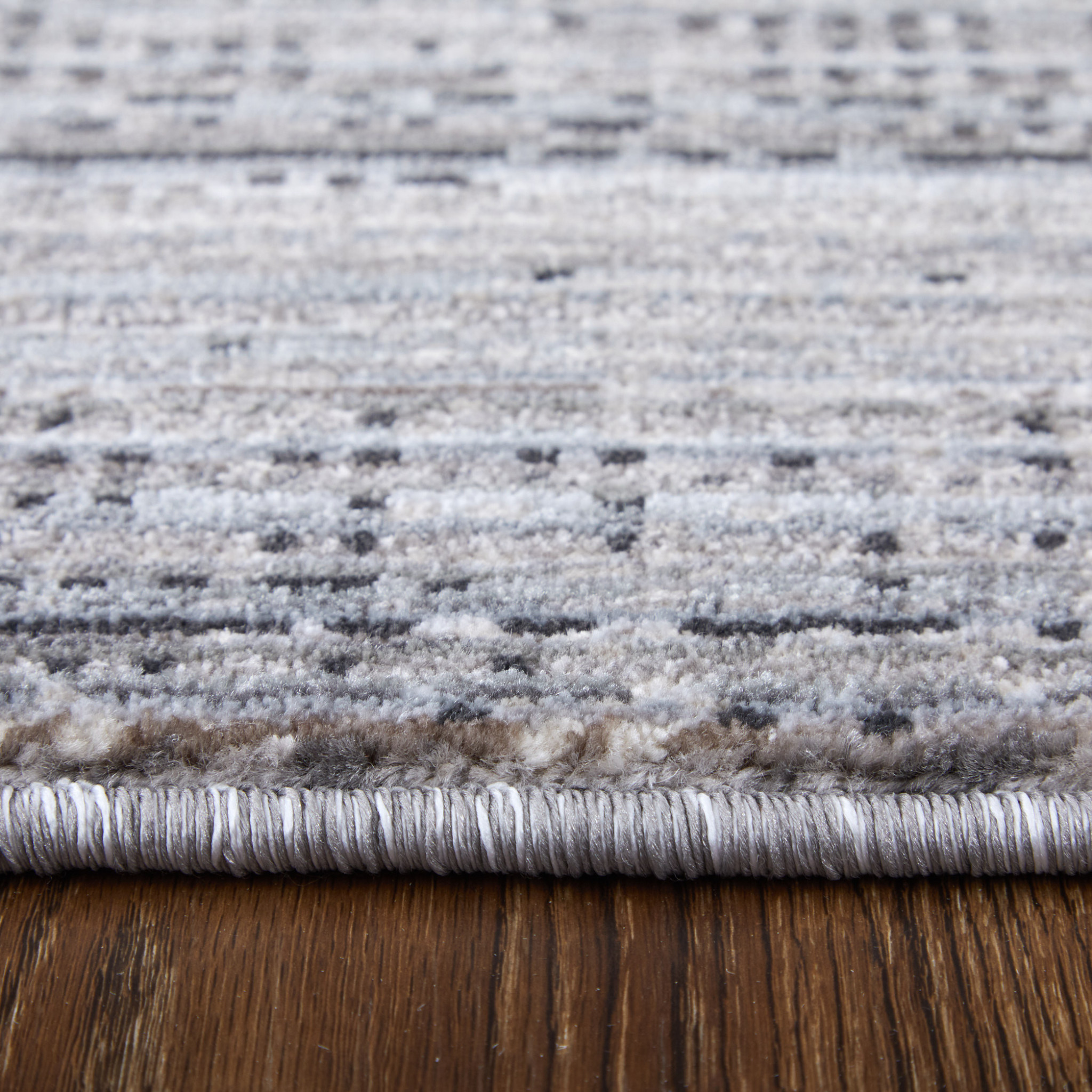 2" X 3" Gray and Ivory Power Loom Area Rug