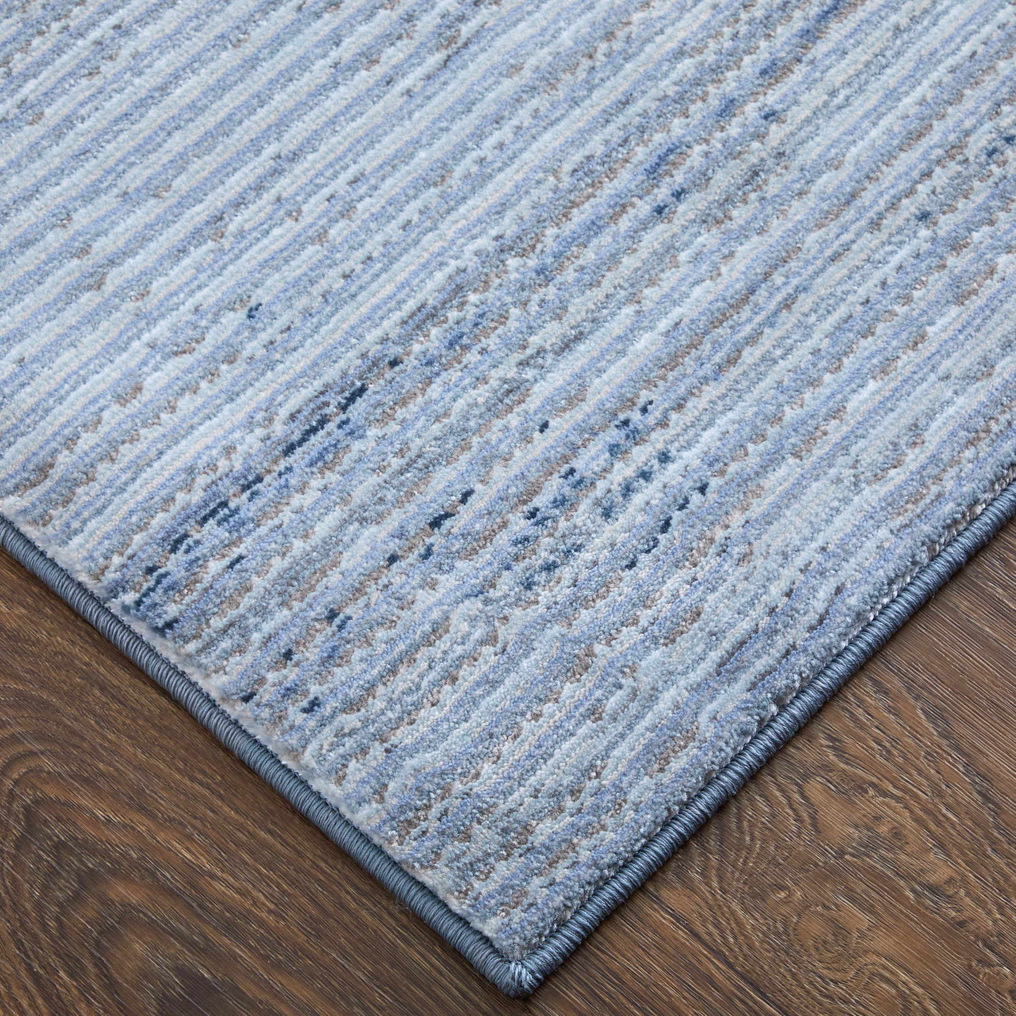 2" X 3" Blue and Ivory Power Loom Area Rug