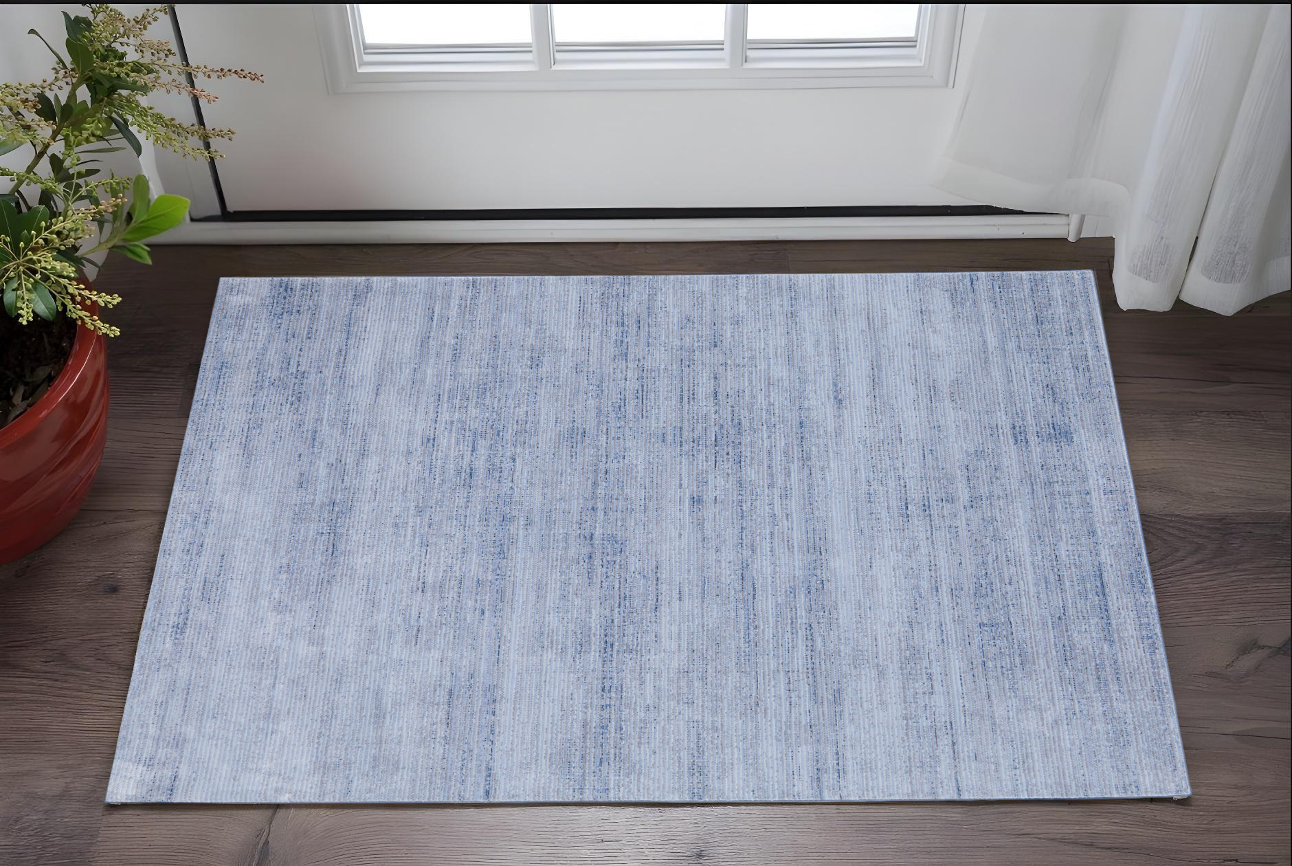 2" X 3" Blue and Ivory Power Loom Area Rug