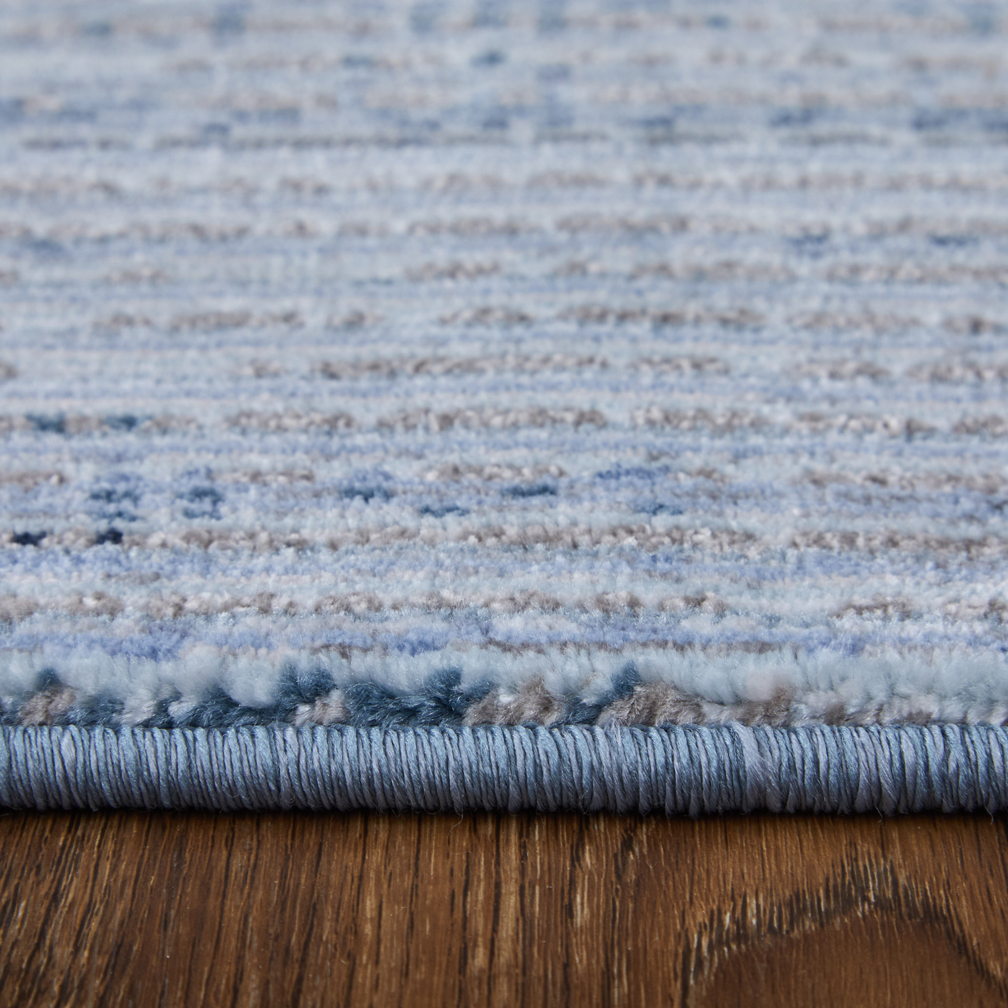 2" X 3" Blue and Ivory Power Loom Area Rug
