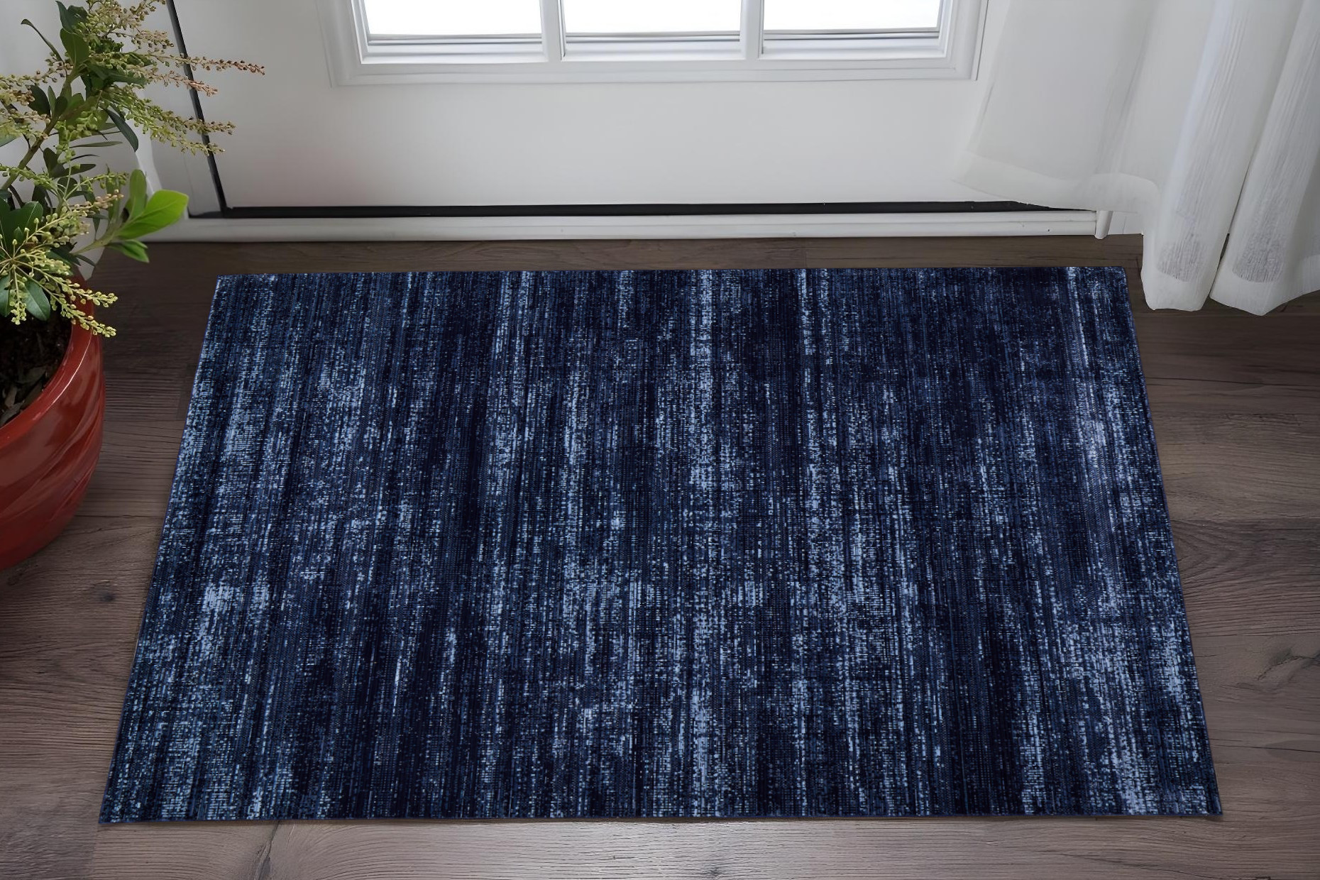 2" X 3" Black and Blue Power Loom Area Rug