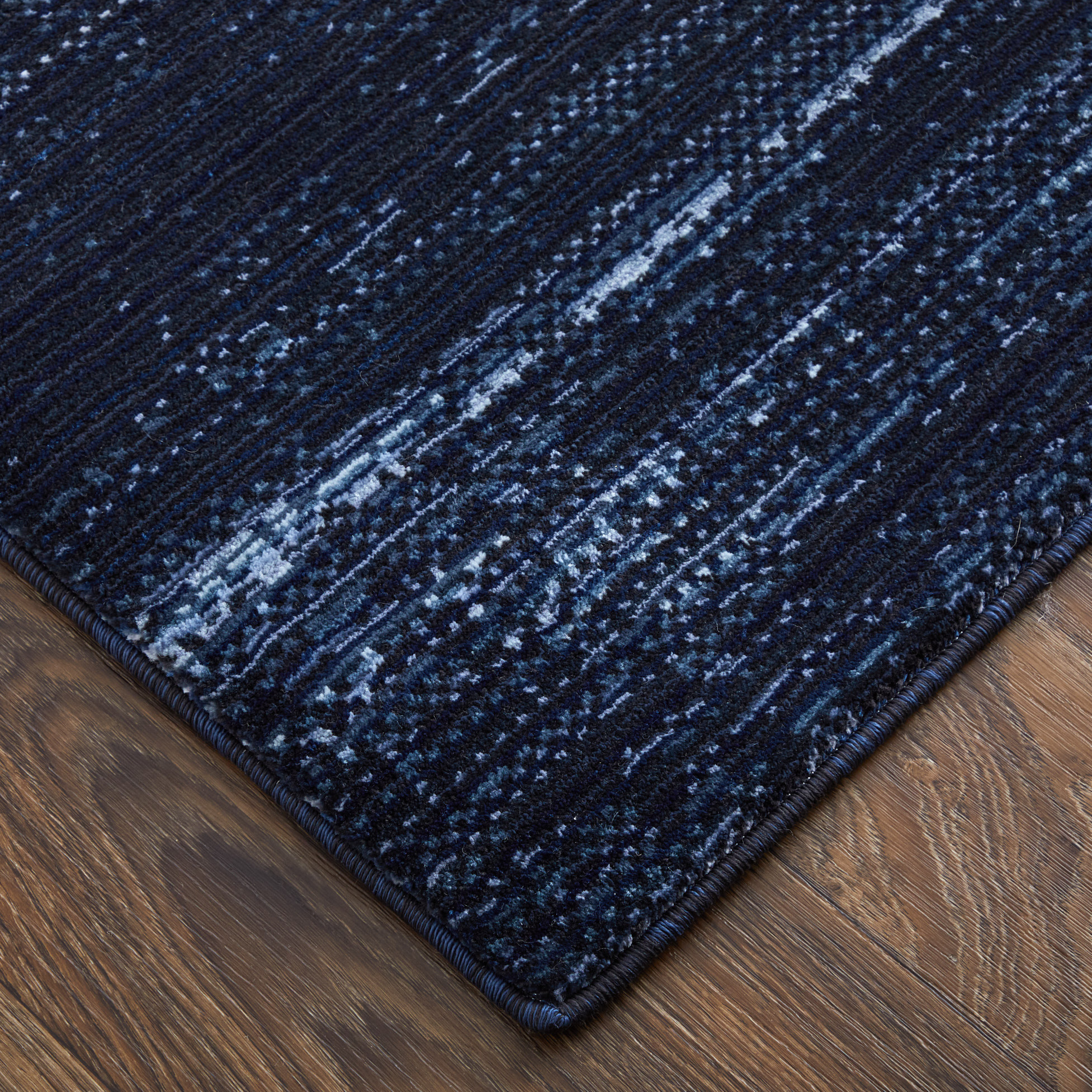 2" X 3" Black and Blue Power Loom Area Rug
