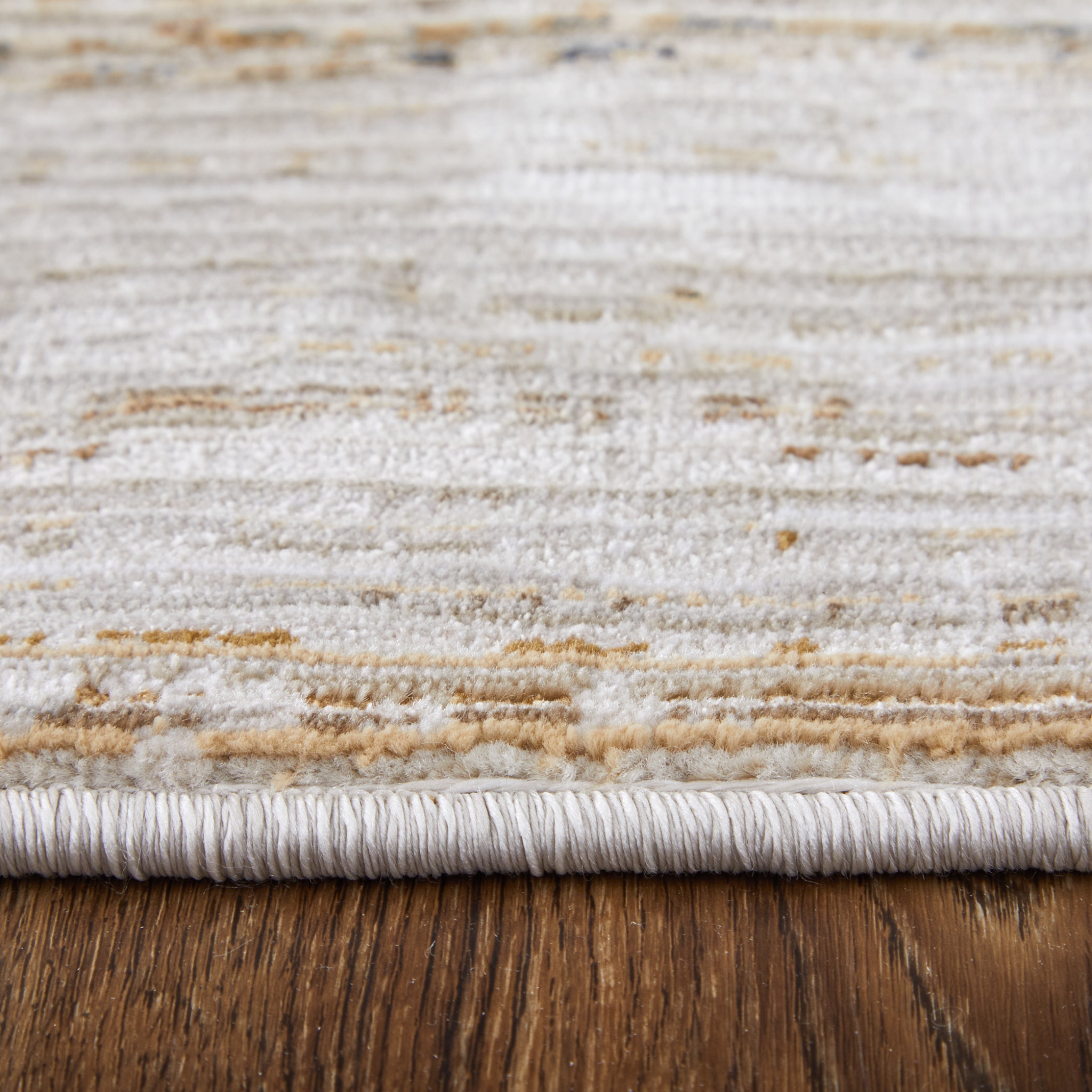 2" X 3" Ivory and Tan Abstract Power Loom Worn Faded Area Rug