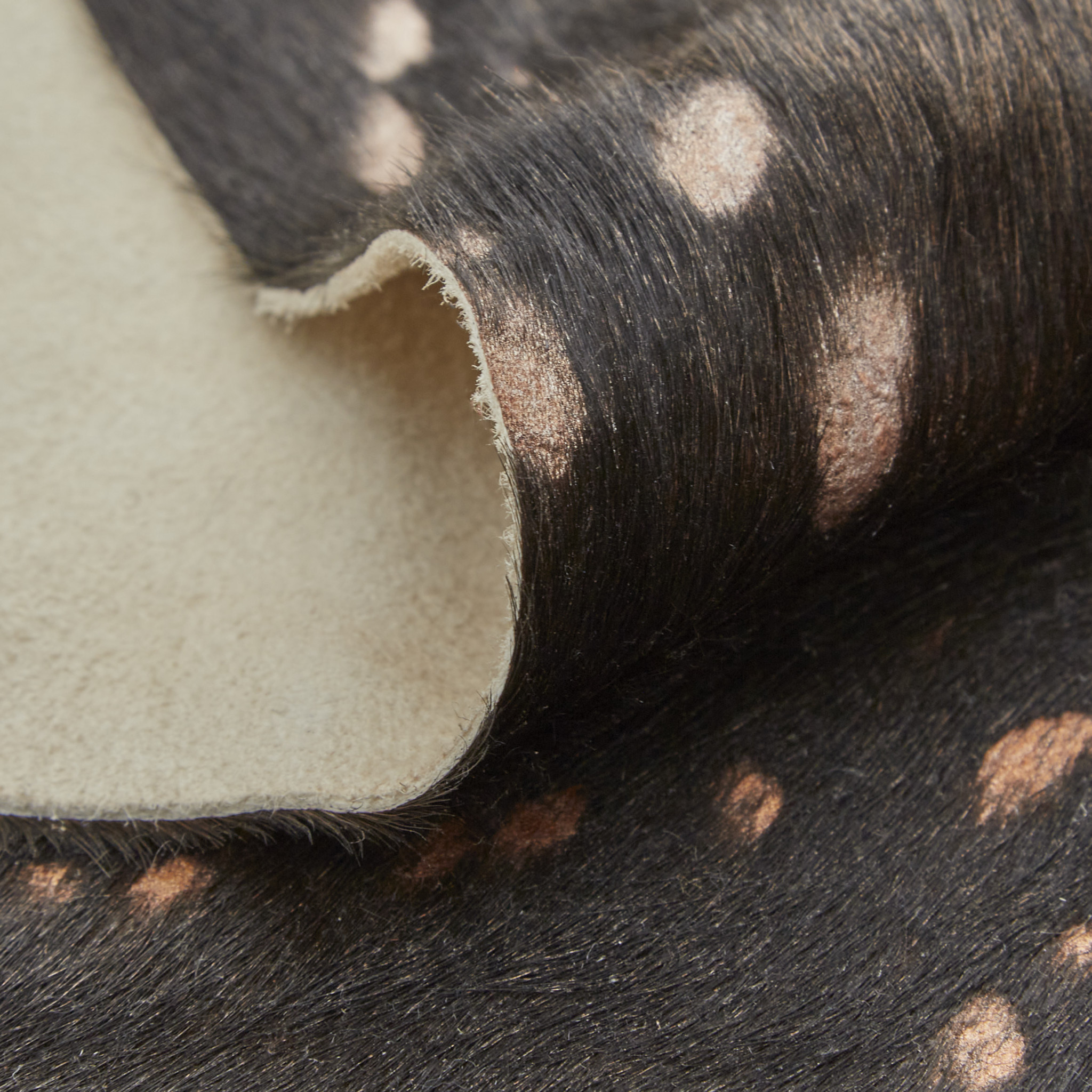 8" X 10" Brown and Tan Cowhide Animal Print Power Loom Area Rug