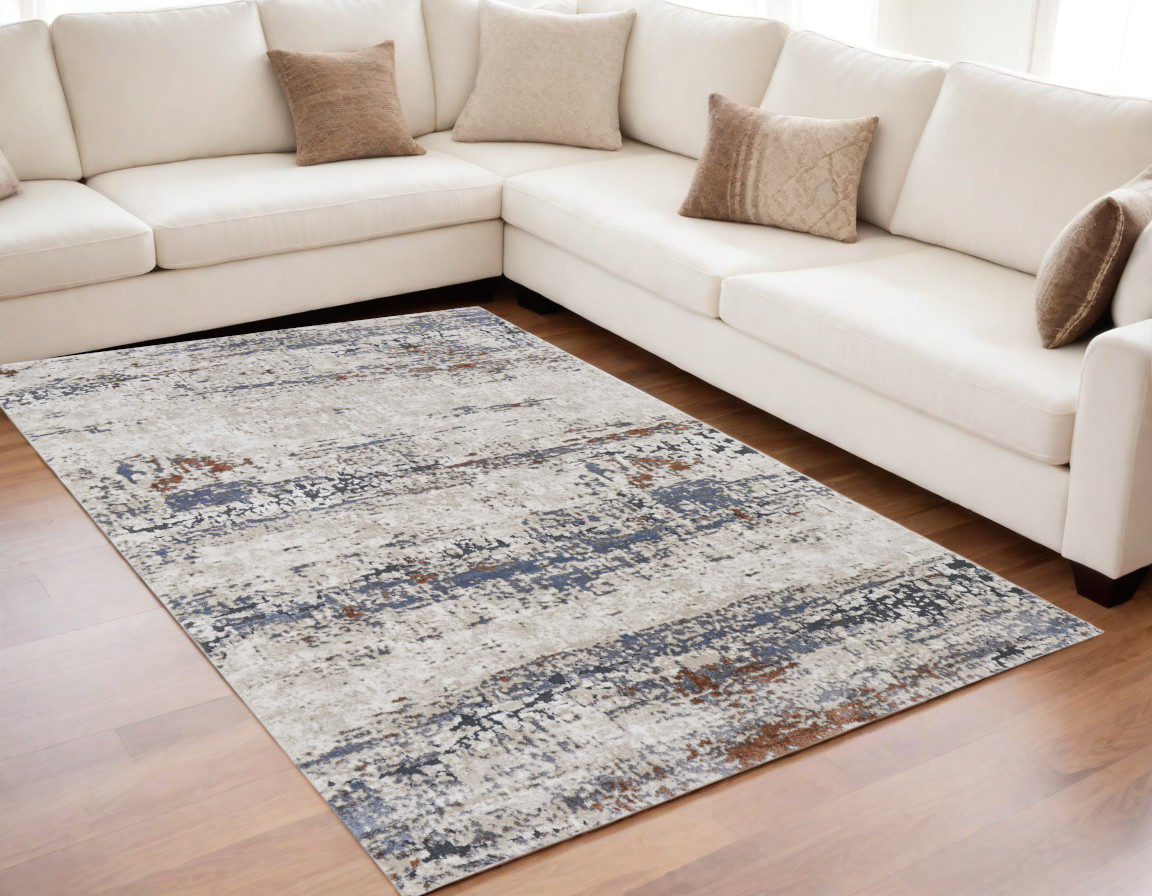 5" X 8" Gray Blue and Ivory Abstract Power Loom Area Rug
