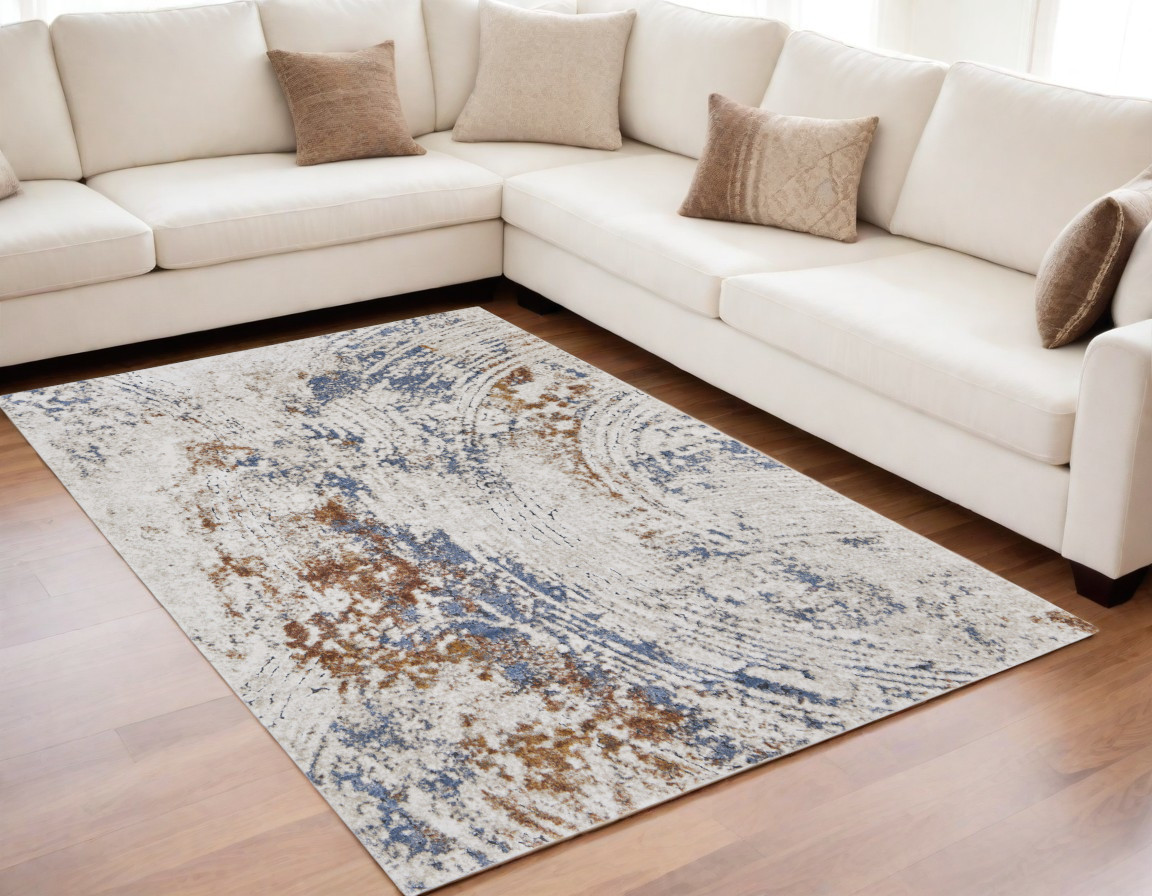 5" X 8" Ivory Blue and Brown Abstract Power Loom Area Rug