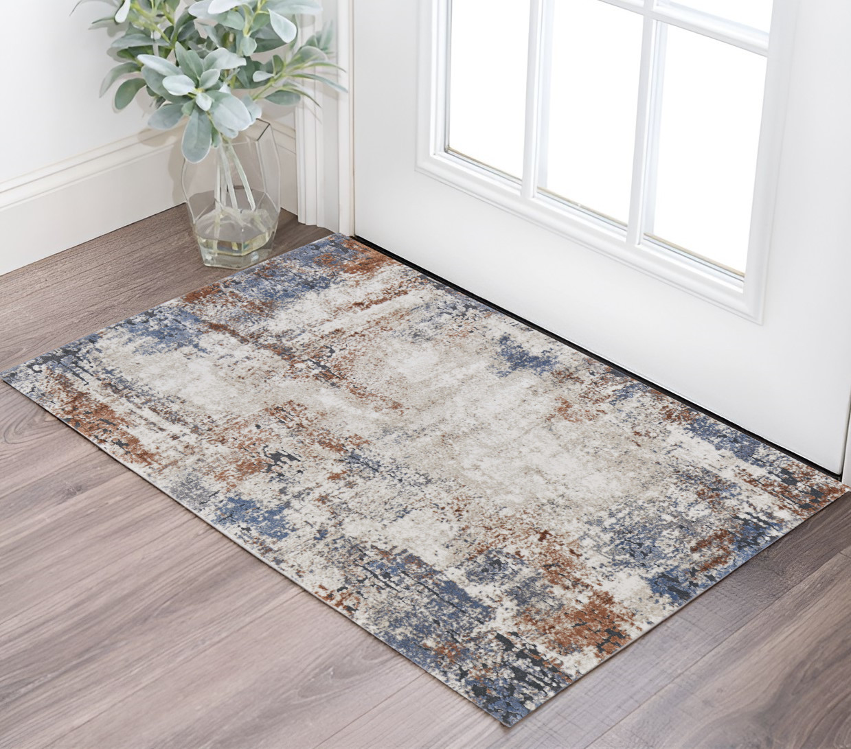 2" X 3" Blue Gray and Brown Abstract Power Loom Worn Faded Area Rug