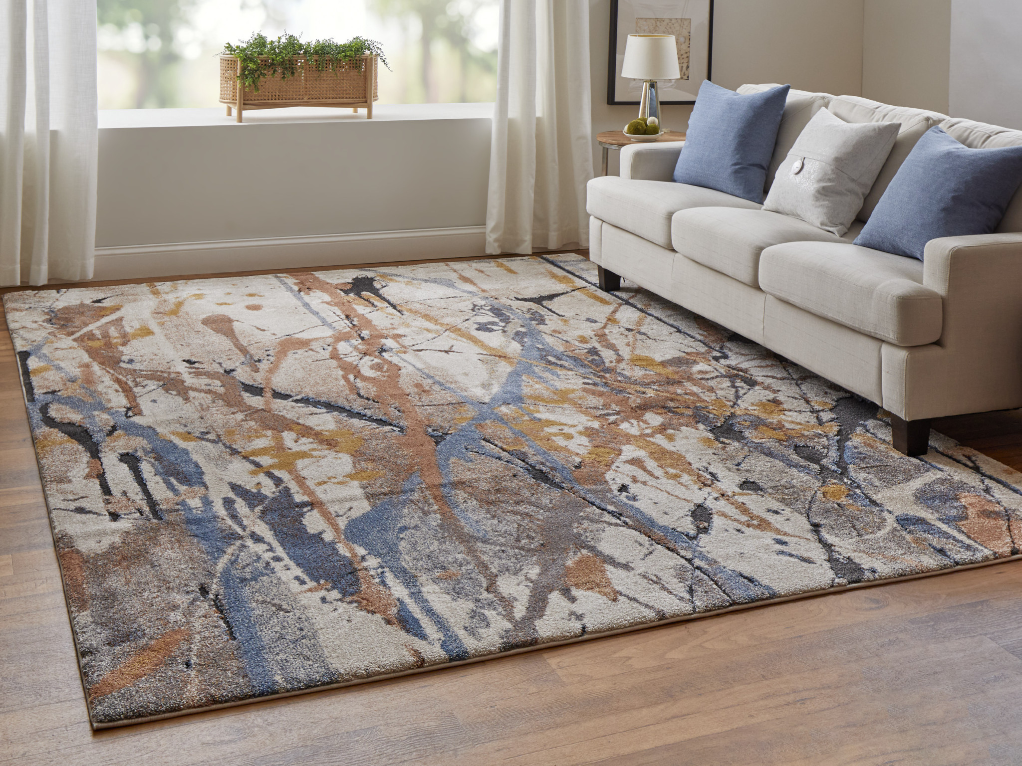 2" X 3" Ivory Blue and Brown Abstract Power Loom Area Rug
