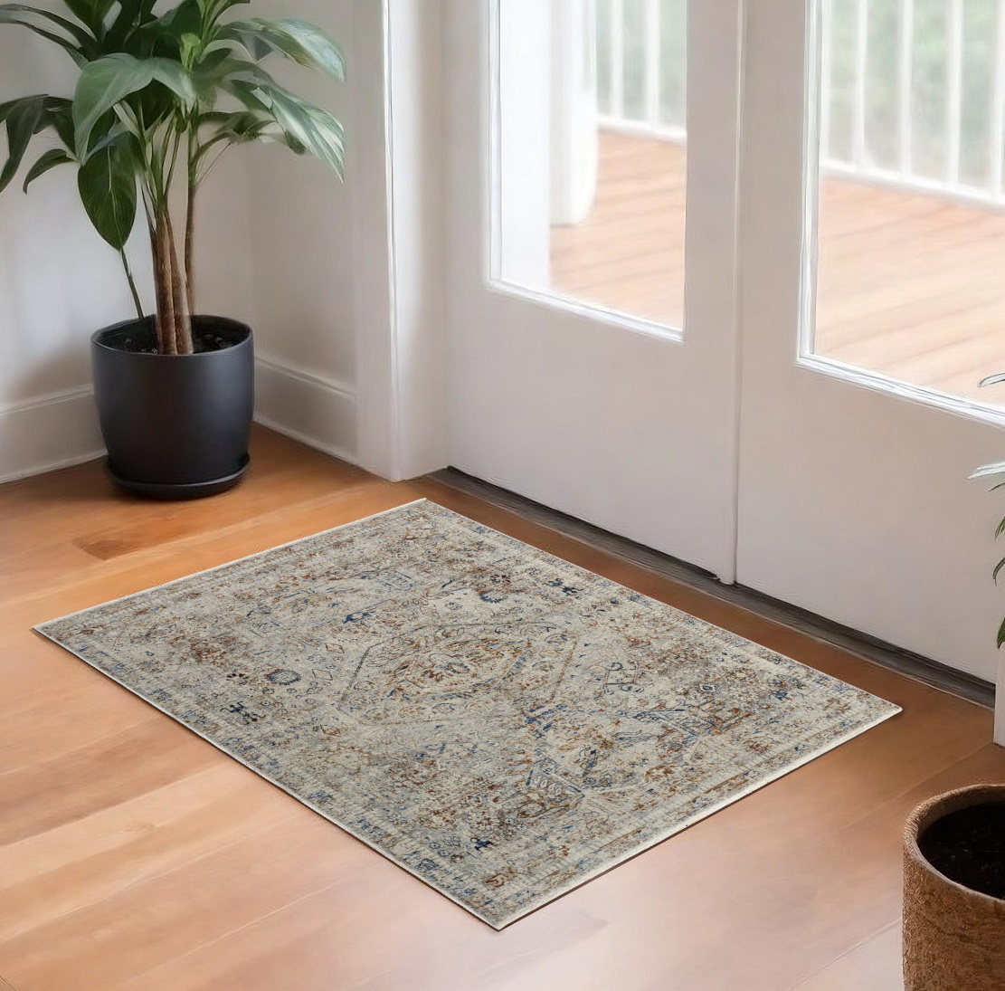 3" X 5" Red Tan and Blue Oriental Power Loom Worn Faded Area Rug With Fringe