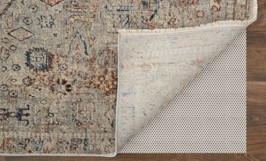 10" Red Tan and Blue Oriental Power Loom Worn Faded Runner Rug With Fringe