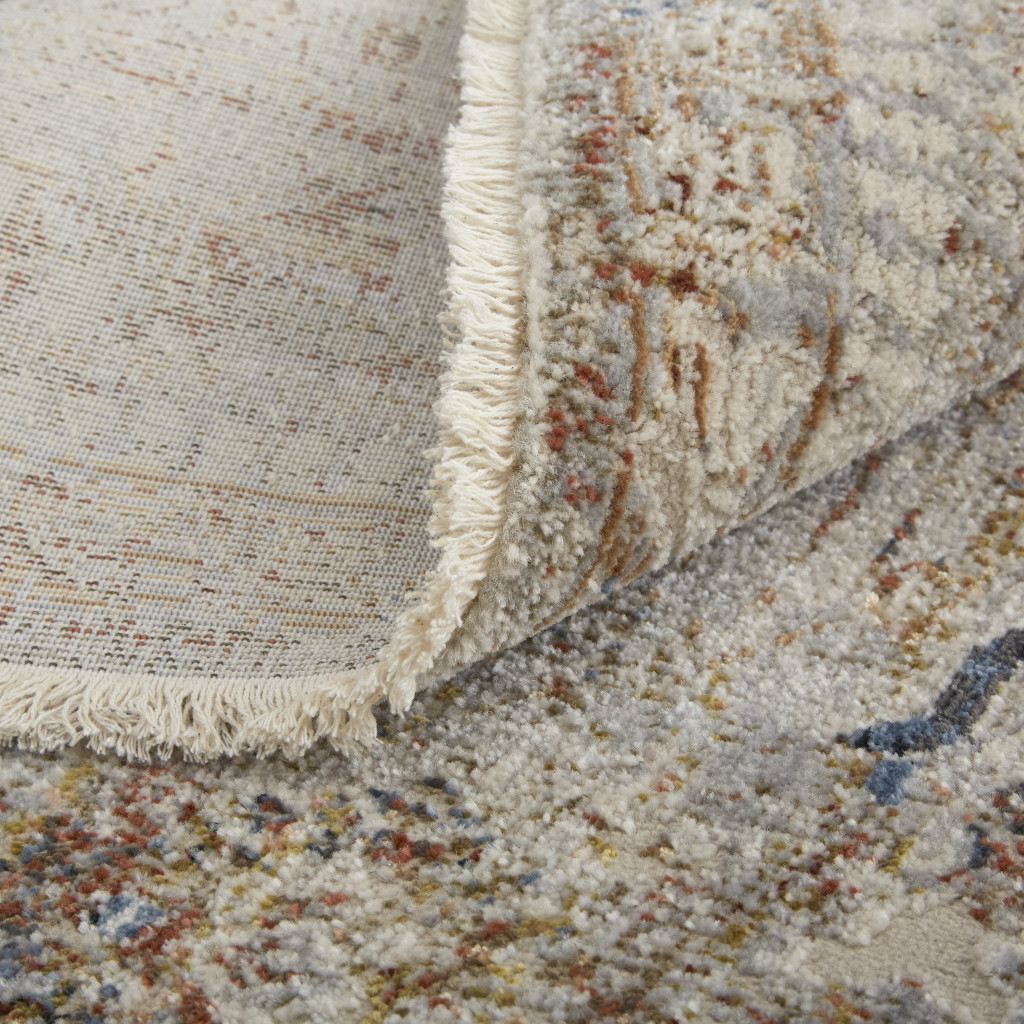 10" Red Tan and Blue Oriental Power Loom Worn Faded Runner Rug With Fringe