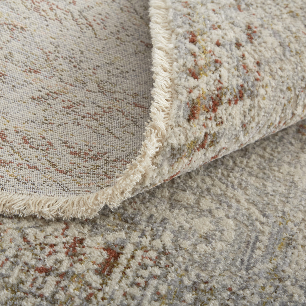 3" X 5" Ivory Gray and Brown Abstract Power Loom Worn Faded Area Rug With Fringe
