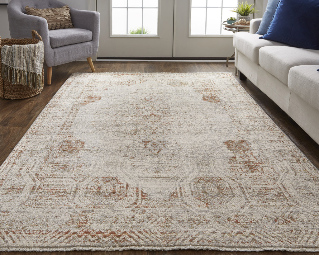 3" X 5" Ivory Gray and Brown Abstract Power Loom Worn Faded Area Rug With Fringe