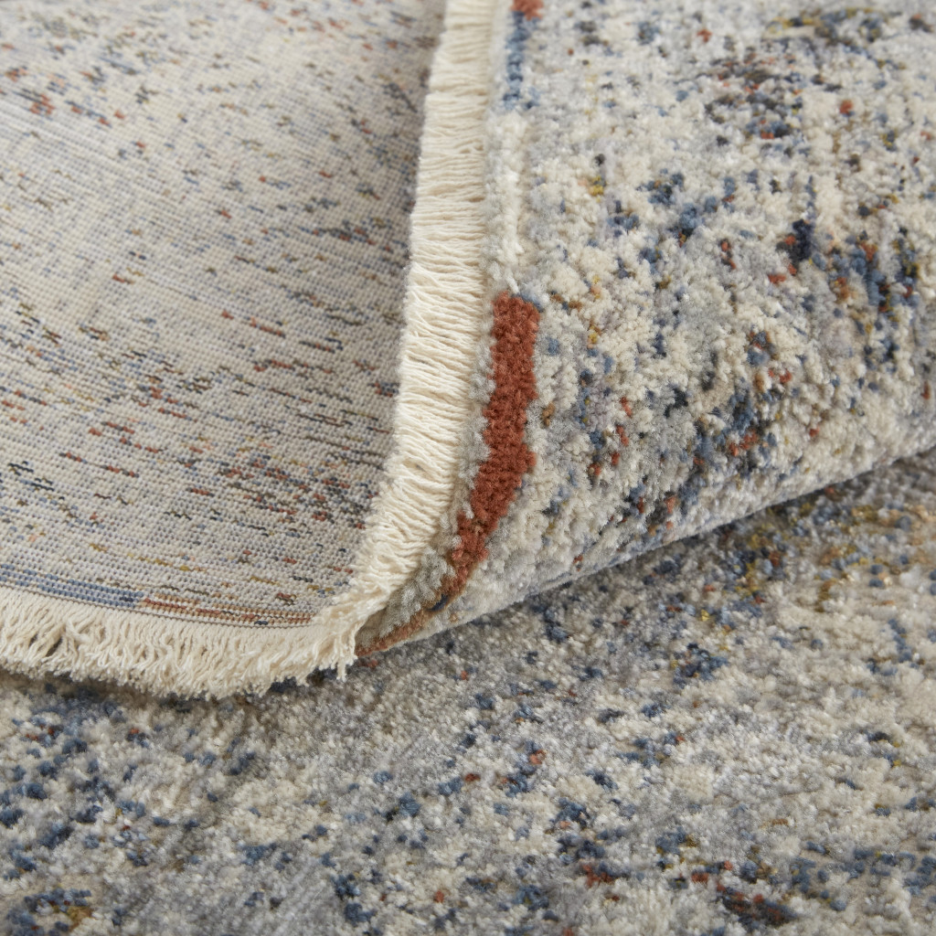 3" X 5" Gray Ivory and Blue Abstract Power Loom Worn Faded Area Rug With Fringe