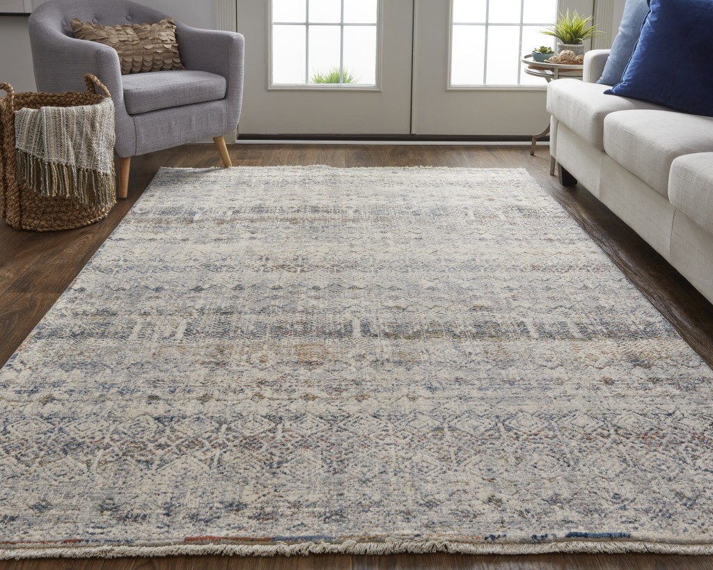3" X 5" Gray Ivory and Blue Abstract Power Loom Worn Faded Area Rug With Fringe