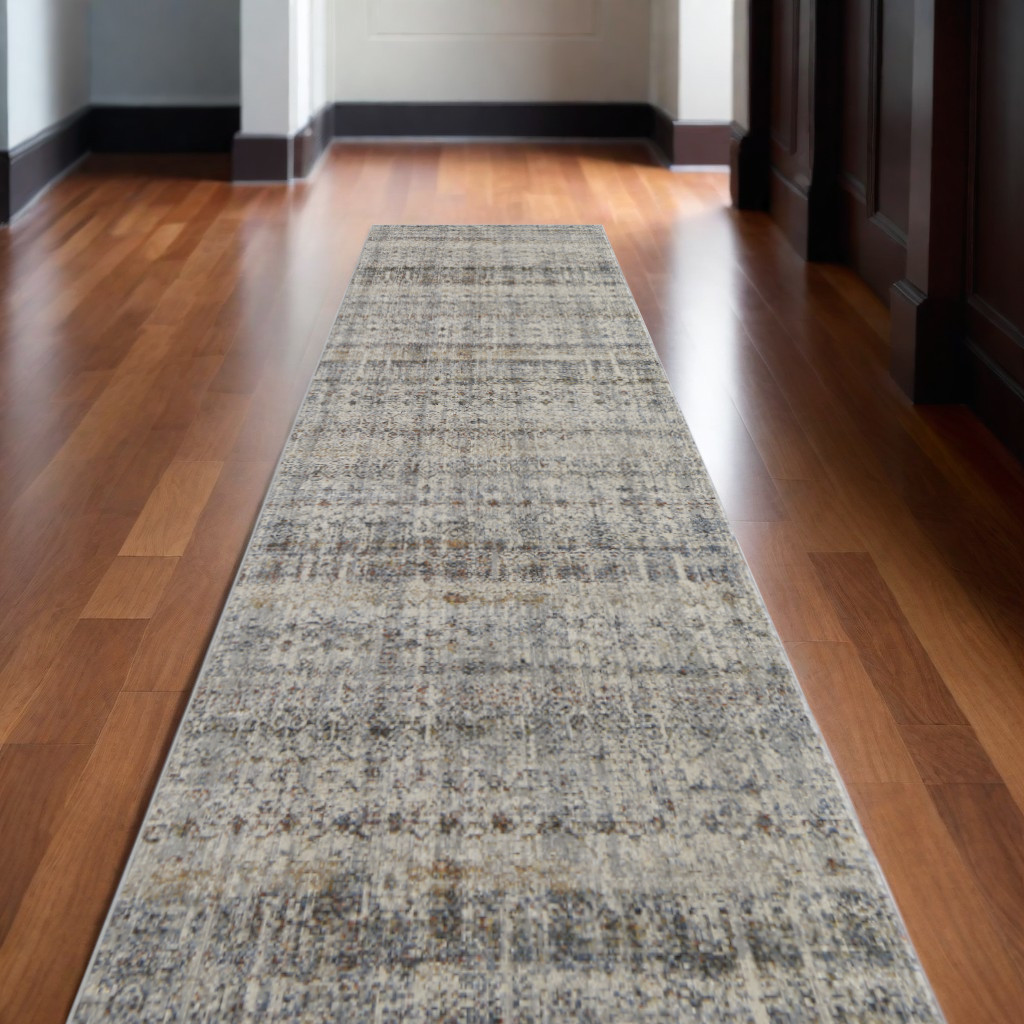 10" Gray Ivory and Blue Abstract Power Loom Worn Faded Runner Rug With Fringe