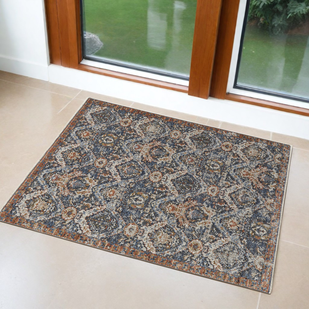 3" X 5" Ivory Blue and Brown Floral Power Loom Area Rug With Fringe